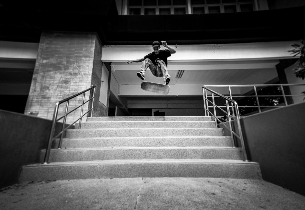 Skateboarding over staircases